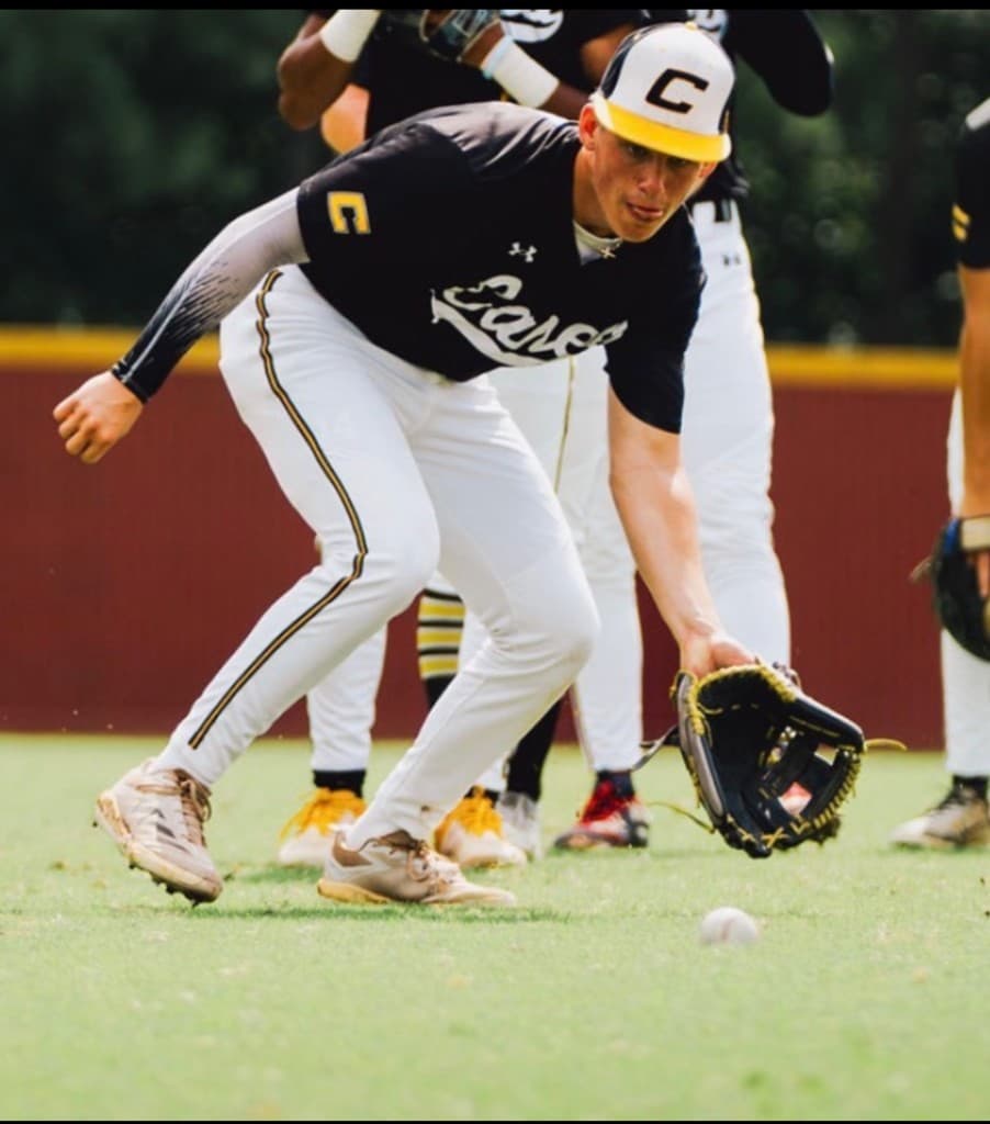 Infielder fielding a ground ball